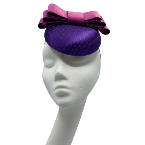 Cadbury purple satin hat with purple satin bow.